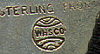 This bookmark is American made by W.H. Saart Co. between 1900 and 1920. It is marked Sterling Front with the makers hallmark. It is a homing pigeon carrying a letter. The blade is not silver.