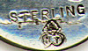This bookmark was made in the US by Henry C. Haskell, manufacturer. It is marked sterling and has a hallmark. It has a shape that is very similar to a bookmark in the Gorham 1888 Autumn catalog. The date is probably somewhere around that date.