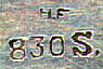 This bookmark is from Norway. It is marked HF 830S. The date is probably 1950 - 1960. the top of the bookmark is a fat man, probably a cartoon character or character from a childrens book.