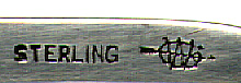 This bookmark is made in the US by Webster Company from North Attleboro, Mass. It is marked Sterling and the manufacturers mark. It is a strange mark in that there is no apparent way that it can be used to clip onto a page like most other bookmarks. It's possible that it is not a bookmark at all but if not, then what is it? The date is between 1910 and 1930.