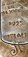 This bookmark was made in Mexico between 1930 and 1940. It is marked Hecho en Mexico, 0925, Citlali and some kind of design hallmark. It also has the eagle hallmark with the number 214. The top is an Aztec design.