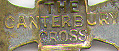 This bookmark was made in England between 1900 - 1910. It is made of silver plate over brass. The top is the Canterbury Cross and is marked as such on the back.  