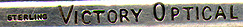 This bookmark was made in the US by an unknown manufacturer. It is probably not a bookmark at all but most likely a tie clip. It is marked sterling Victory Optical. It is in the shape of eye glasses. The date is 1960 - 1970.