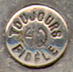 This bookmark was made in France between 1940 - 1960. It is silver plate and has a hallmark on the back which says Toujours Fidele and HQ in the middle. It has a womans head on the and flowers on the top blade.