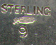 This bookmark is a William B. Kerr & Co. piece. It is marked Sterling with the American Beauty mark and is stamped with number 9. Date is 1900 - 1910.  