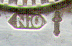 This bookmark was made Holland. It is marked NIO and the symbol of a sword. The top is a figural of a tower and underneath is the word Groningen, a city in the Netherlands. Date is 1920 - 1936.