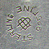 This bookmark was made in the US by Unger Brothers. It is marked with the makers hallmark of a U intertwined with a B. It is a figural flower and was sold in the 1904 Unger Brothers catalog. 