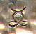 This bookmark was made in the US by an unknown manufacturer. It is marked Sterling on the back and has an unknown mark on the bottom of the middle blade. It is handmade with a hand hammered finish. The top has a brown and white agate stone. The date is 1920 - 1940.