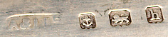  This bookmark was made in Birmingham, England. It is marked the manufacturers mark and the hallmarks for Birmingham and the year 1907. The top is a purple garnet thistle  