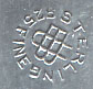  This bookmark was made in the US by Unger Brothers. It is marked with the manufacturers hallmark of the intertwined U and B. The top is an art deco design and the front is inscribed Anna 1911.  