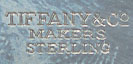  This bookmark was made in the US by Tiffany and Co. It is marked with the manufacturers hallmark of Tiffany and Co Makers and Sterling. It is in the shape of the Male symbol. 