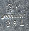  This bookmark was made in the US by Redlich & Co. It is marked sterling, 361 and has the manufacturers hallmark. The top has fruits and leaves. The date is 1900 - 1910.   
