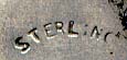  This bookmark was made in the US by an unknown manufacturer. It is marked sterling on the back. The top is an art nouveau design of a flower.    