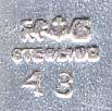  This bookmark was made in the US by Gorham Corporation from Providence, Rhode Island. It is marked with the manufacturers hallmark and 48. It is one of 33 bookmarks from the Autumn 1888 silver catalog. The top depicts the head of a Roman citizen. The date is 1888.    