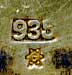  This bookmark was made in Europe. It is marked 935 and has an unidentified hallmark. It is has celluloid (french ivory) blades and a silver and enamel shield on top. The date is 1920 - 1930.  