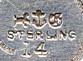 This bookmark was made in the US by Gorham. It is marked with the manufacturers hallmark and 14. This is one of the 33 bookmarks from the Autumn 1888 Gorham catalog. The handle and top blade have a array of flowers and leaves. The date is 1888.  