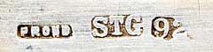 This bookmark was made in Austrailia by Prond. It is marked STG 925 for sterling. The to is a figural bird, possibly a woodpecker sitting on a boomarang. The date is 1950 - 1970.