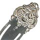 This bookmark is in the Gr. Baroque style name from Wallace, the manufacturer. It has the makers hallmark and is marked Wallace Sterling. It is probably a couple of years old.
