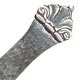 This bookmark is Danish marked with the Swedish import marks. It is marked lmp. H.Gr. 830 S on the back. It has a scallop shell on the top and the blade is hand hammered. Date is 1917 - 1938.
