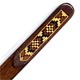 This bookmark was made in England. It is a piece of Tunbridge Ware. "Tunbridge ware is a form of decoratively inlaid woodwork characteristic of the spa town of Tunbridge Wells in Kent in the 18th and 19th centuries. The decoration typically comprises a mosaic of many very small pieces of different coloured woods that form a pictorial vignette. Shaped rods and slivers of wood were first carefully glued together, then cut into many thin slices of identical pictorial veneer with a fine saw. Elaborately striped and feathered bandings for framing were pre-formed in a similar fashion." The date is 1880 - 1900.