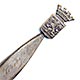 This bookmark was made in France. It has a lion passant in a shield with a crown on top.