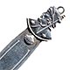 This bookmark was made in Spain and is marked Maside, which according to Wikipedia, is a municipality in Ourense (province) in the Galicia region of north-west Spain. The top is the head of a conquistador. The date is unknown.