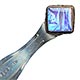 This sterling bookmark was made in Birmingham England in 1921 by G W Lewis as indicated by the hallmarks. The top has a glass enclosed piece of a butterfly wing in iridescent blue. It is still quite vibrant after 95+ years.