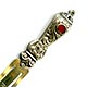 This bookmark was made in Israel by an unknown manufacturer. It is unmarked except for the printed inscription on middle blade marked Jerusalem. The top is an ornate design with a red glass jewel. 