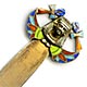 This silver and enamel Egyptian Revival bookmark was made in Europe in the 1920s. It is a hollow repousse relief depicting a pharoh's head with two ankhs and stylized flowers. The piece is finished in a gilt wash over. It is marked 800 on the back and likely dates to the time when the discovery of Tutankhamun's tomb inspired a new Egyptian Revival in design. The enamelled pharoah's head is set on a hinge, so it can be clipped over a page to help secure itself.