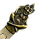 This bookmark was made in Europe by an unknown manufacturer. The top is a high relief solid brass Imp, possibly the Lincolnshire Imp, and the blades are a white metal. The Imp is sitting cross legged with a big grin.