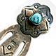 This is an older signed silver book mark with tamp work and blue turquoise stone in a serrated bezel. Marked on the back JCJ and STERLING, made by Isleta Pueblo silversmith Joann Christine Juancho.