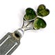 This bookmarks was made in England by William J. Holmes in 1903. The top is a three leaf clover in connemara marble.