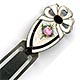 This bookmark was made in the US by F.A. Hermann Co. It is barely marked sterling but is the same as others in this collection. The top is an enamel shield with a bow above and a pink flower in the center.