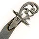 This bookmark was made in the US by an unknown manufacturer. It is hallmarked sterling on the back. It has a very small top blade and a curvy larger one. The top has a cutout flower.
