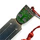 This bookmark was made in Finland. It is marked for the year 1957 and 813H indicating a silver content of .830. The top is an enamel coat of arms for the town and former municipality of Ekenäs which has merged with Pohja and Karis to form the new municipality of Raseborg on January 1, 2009.