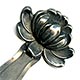 This bookmark was made in the US by an unknown manufacturer. It is marked sterling on the back. The top is a flower in full bloom.