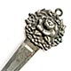 This bookmark was made in the US by an unknown manufacturer. A very thin piece, the top has an art nouveau rose flower. It is marked sterling on the back.