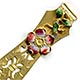 This bookmark was made in France. It is gold dorè and has an enamel flower and leaves which serves as the upper blade with a cutout longer blade.