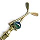 This bookmark was made in France. It has two crossed golf clubs with an agate marble between them on the top.