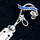 This bookmark was made in Great Britain by an unknown manufacturer. It is marked sterling but the hallmark is too warn to make out. The top has a banner in blue enamel with the word Killarney inlaid in silver. It also has a 3 leaf clover with green agate
