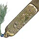 This bookmark is made in Japan between 1890 - 1910. It is made of brass with a picture of a small bird on a branch of a tree in relief on the smaller blade and a bird in flight near a plant engraved on the longer blade. This one also has the original bead and tassel at the top. The dealer said she found this with a collection of Japanese page turners that she purchased. This looks like smaller versions of them.