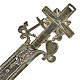 This bookmark was made in Sweden. It is has four marks, only two of which can be made out. The state mark of Sweden and a date mark L5, indicating that this was made in 1865. The silver content is .830. It has the symbols for Faith, Hope and Charity and is very similar to bookmark 83 in group 5.