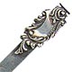 This bookmark was made in the US. It is only marked Sterling and the top blade is in the shape of something art nouveau. It was probably made between 1900 - 1920. The manufacturer is unknown.