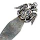 This bookmark is from Peru. It is marked RI 8314 925. The date is unknown. It looks like a two headed turtle with wings and a shield.