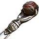 This bookmark was made in Scotland by an unknown manufacturer. It is unmarked and is made of silver plate over brass. It is in the shape of a hand holding an agate marble. The date is probably 1910 - 1920.