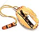This bookmark was made in New Mexico sometime in the 1940's. It is made of copper and has a hand painted covered wagon being pulled by two oxen.