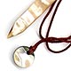 This bookmark was made in the US by an unknown manufacturer. It is made of Abalone shell. The date is unknown.