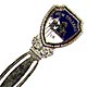 This bookmark was made in the US as a souvenir for New Orleans, LA. It is made of some kind of metal with blue and white enamel on top. The top is in the shape of a shield with the words New Orleans LA and a lion and a tower. Date is unknown.