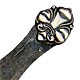 This bookmark was made in the Norway. It has hand hammered blades and a fleur-de-lis on the top. It is marked P&B 830S on the back. Date is probably 1920 - 1930.