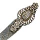 This bookmark was made China. The top has the Chinese symbol meaning "Good Fortune". The bottom blade has a bamboo leaf pattern. Date is unknown.